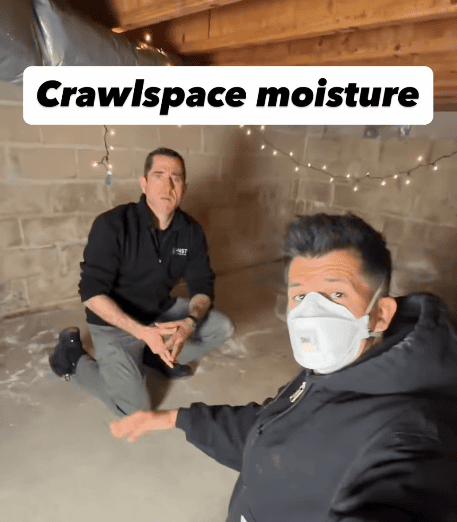 John Skelly and a colleague conducting an indoor environmental inspection inside a home.